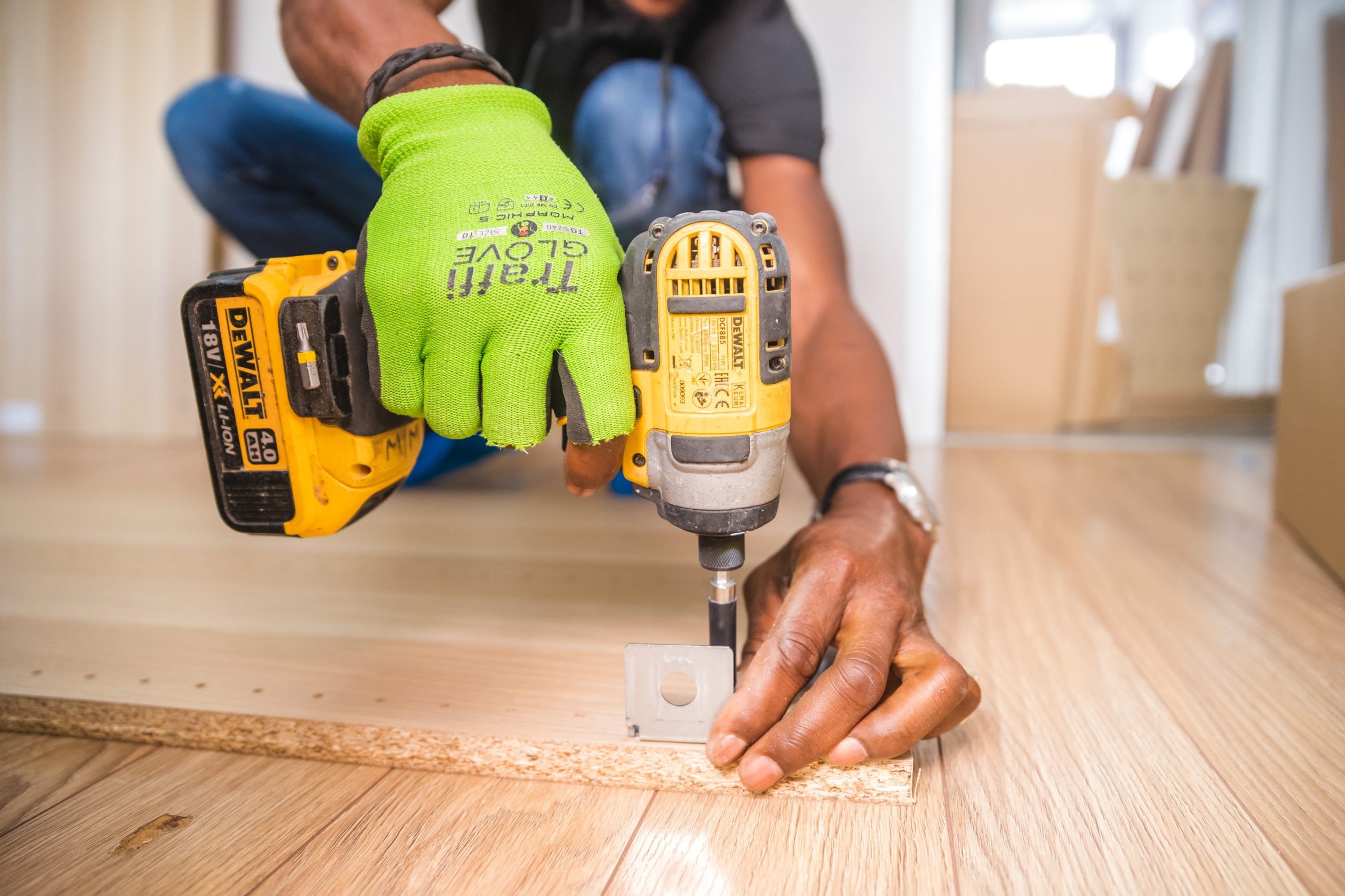 Photo by Bidvine: https://www.pexels.com/photo/person-using-dewalt-cordless-impact-driver-on-brown-board-1249611/